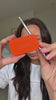 Woman applying RISE Brow Styling Balm for fluffy natural brows